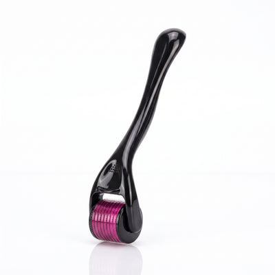 Microneedling roller standing upright showing needle cylinder and handle