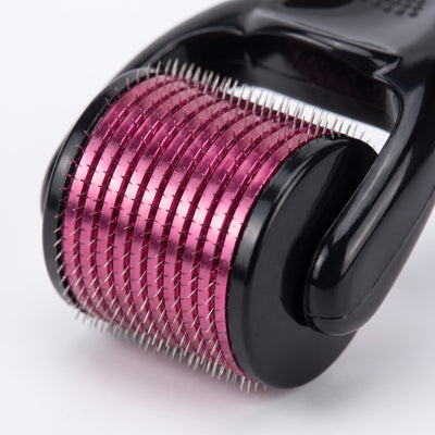 Macro close-up of stainless steel microneedle rows on roller head
