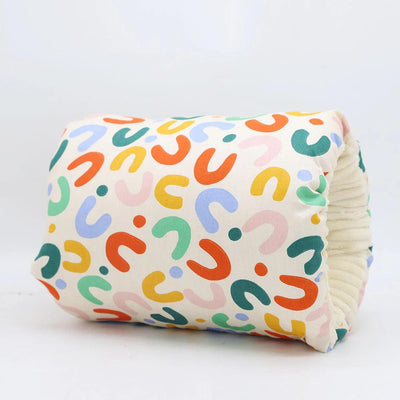 Rainbow swirl print nursing arm pillow front view