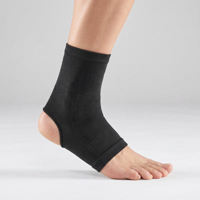 Black ankle sleeve worn on lower leg and foot