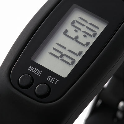 Macro closeup of step counter LCD screen and buttons