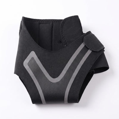 Black elastic ankle support flat lay showing V-pattern and velcro strap