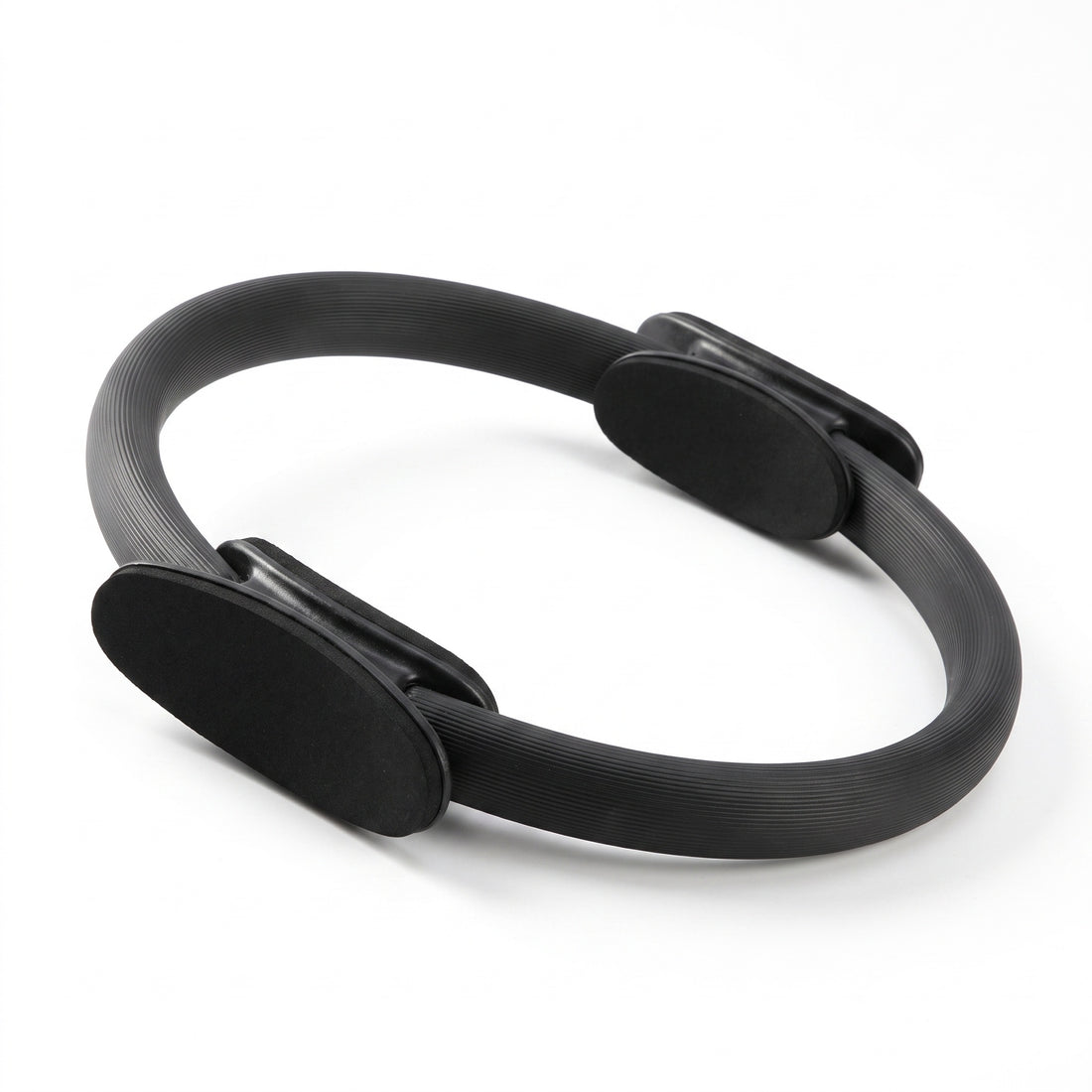Black Pilates ring on white background