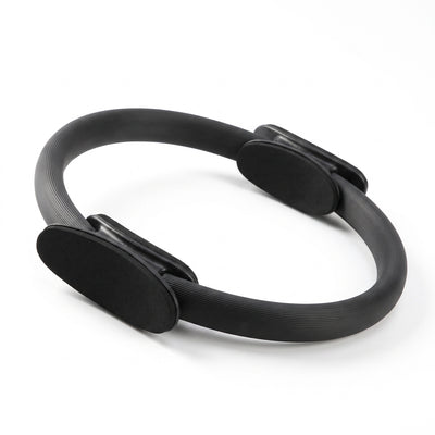 Black Pilates ring on white background