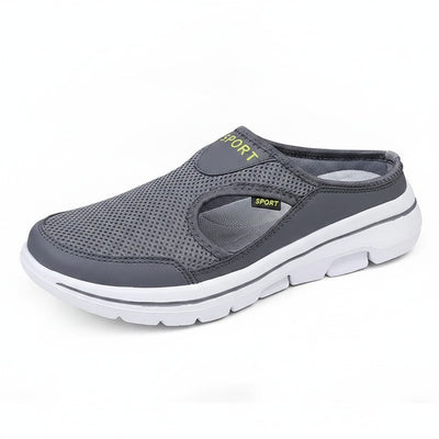 Gray mesh sandal with green accents on white background