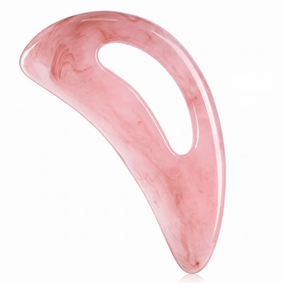 Pink marbled Gua Sha body massage tool on white background