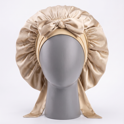 Champagne beige satin sleep bonnet on display form
