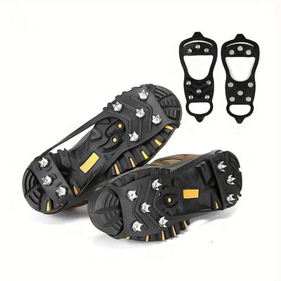 Pair of black ice cleats with steel studs on boots