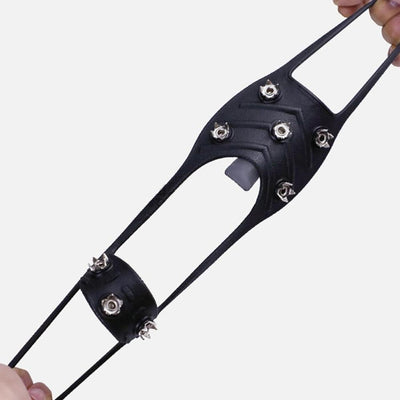 Hands stretching elastic ice cleat band