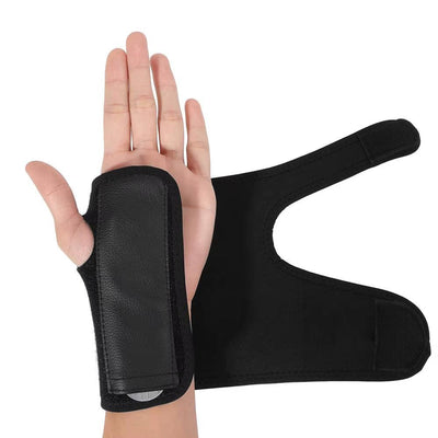 Black wrist stabilizer brace shown with hand palm up