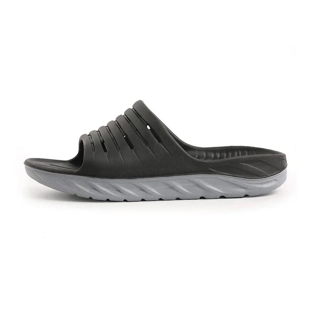 Black cushioned slide slipper side view