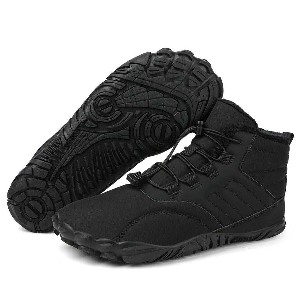 Black barefoot winter boots pair showing rugged sole
