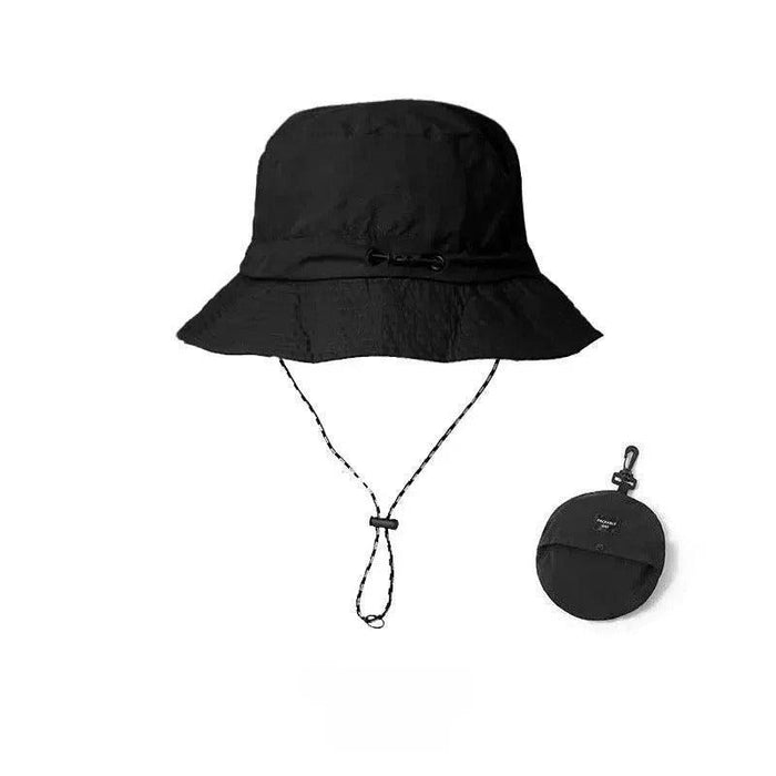 Black packable bucket hat with chin strap and foldable storage pouch