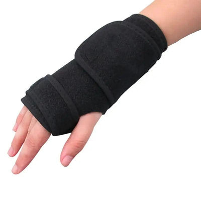 Hand and forearm wearing adjustable black wrist brace