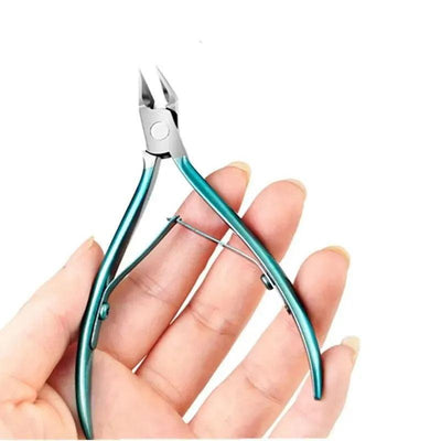 Hand holding stainless steel toenail nipper with spring hinge