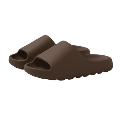 Brown EVA slide slippers pair on white background