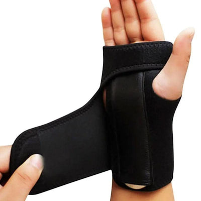 Hands fastening the wrist brace hook-and-loop strap