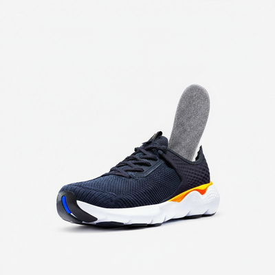 Gray fleece insole inserted into a navy running shoe
