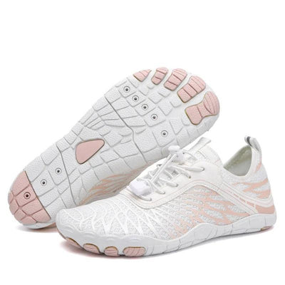 White and pink barefoot shoes pair displaying flexible tread and upper