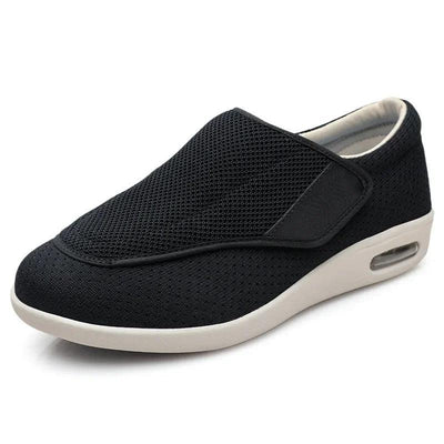 Black wide-fit shoe side profile with velcro strap