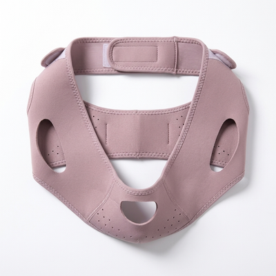 Mauve jawline support wrap laid flat showing full shape