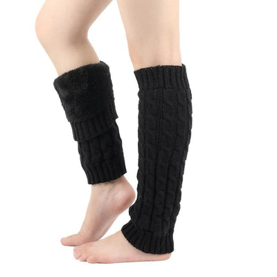 Black cable-knit leg warmer with fleece cuff worn on calf
