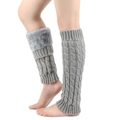 Gray cable-knit leg warmer with plush fleece cuff on calf
