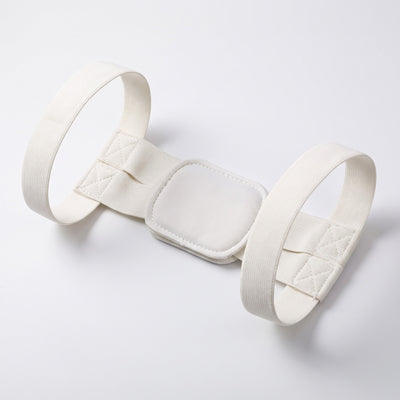 White posture brace flat lay on white background