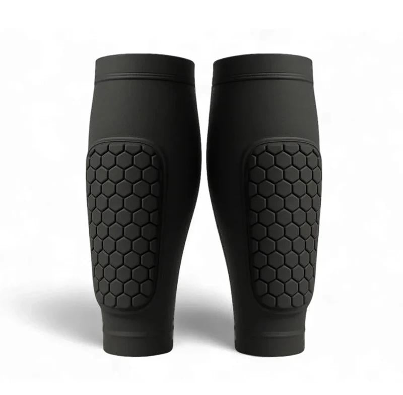 Black shin guard compression sleeves on white background