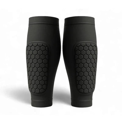 Black shin guard compression sleeves on white background