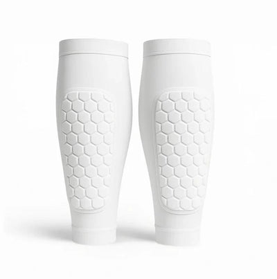 White shin guard compression sleeves on white background