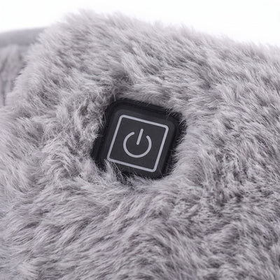 Closeup of power button on plush heating belt fabric
