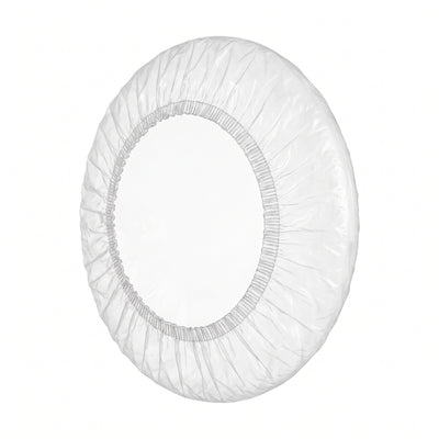 Transparent disposable ear cover on white background